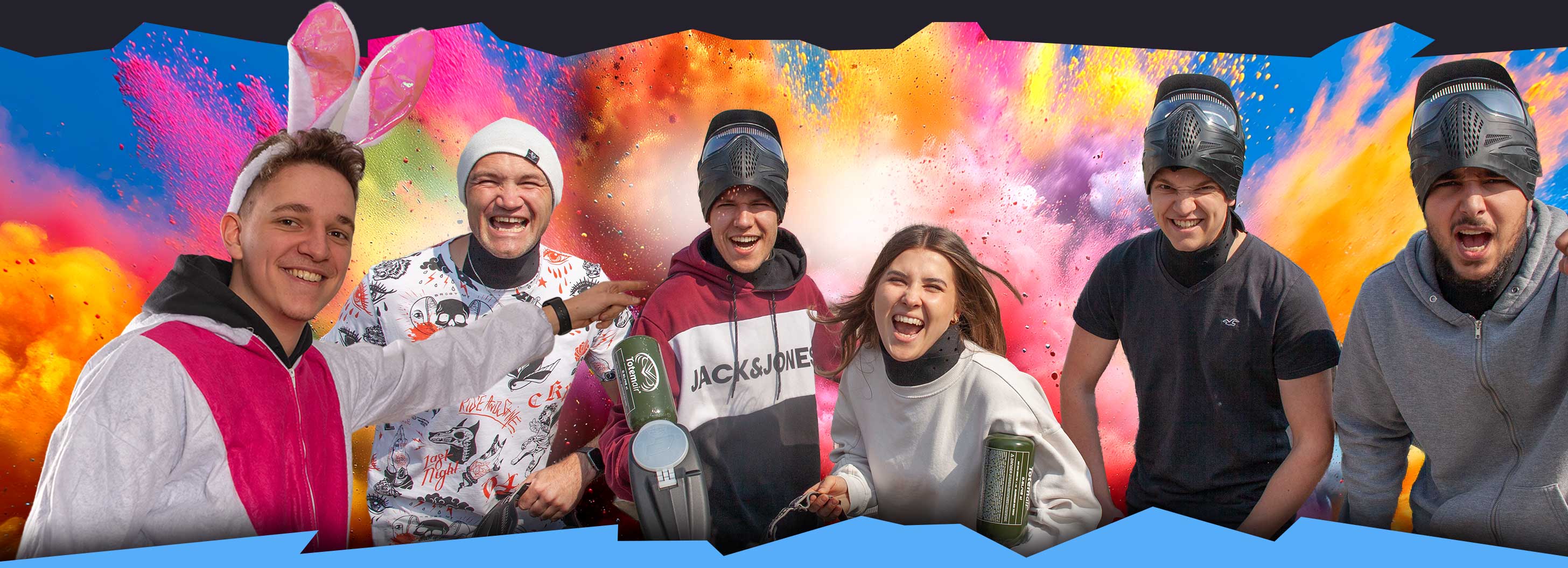 Eine Gruppe glücklicher Gäste von action-parks.de Paintball